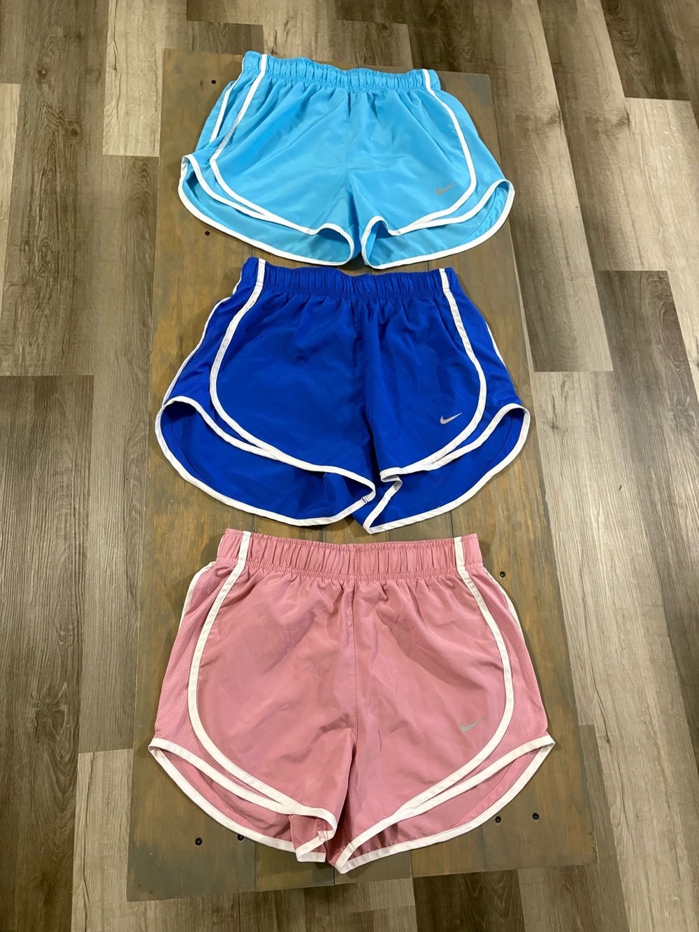 6 pair of Nike Women's Running Shorts - size small.